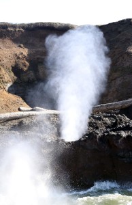 Salt water fountain caused by force of ocean waves.  Spouting Horn at Cape Perpetua, OR