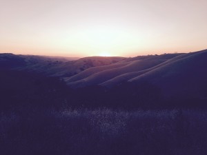 Sunset over foothills overlooking lake Del Valle near Livermore, CA. We are camping in canyon at base of these foothills