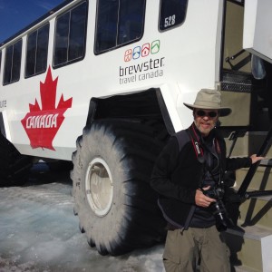 Steve boarding the bus from trip to glacier provides context for size of bus