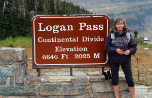 Joan at Entrance to Logan Pass
